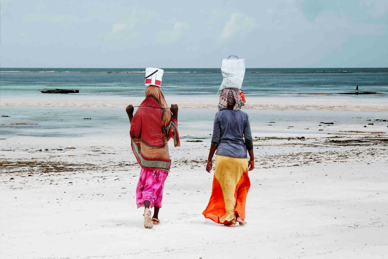 DESTINATIONS ALL AFRICA ASIA EUROPE MIDDLE EAST NORTH AMERICA TRAVEL RESOURCESDIGITAL SHOPWORK WITH MEPRESSHOME What to do in Stone Town Zanzibar (2023) | Much to do on Unguja! A colorful beach hut at Miami South Beach Zanzibar is one of the most sought after island destinations in Tanzania in the Zanzibar Archipelago. Azure beaches and the warm Indian Ocean provide some of the best seafood and sunsets here. The people are welcoming and the town is bursting with culture. Here's what to do in Stone Town Zanzibar to have the best time! Zanzibar is a city, island, and region in Tanzania. Located off the coast of Eastern Africa, it lies east of Dar es Salaam on mainland Tanzania, and west of the border with Kenya. The capital is Zanzibar City. It is a popular tourist destination known for its history and beaches. Of historical importance, Zanzibar is the only place in Africa where cloves grow and was once a major clove producer. Moreover, the island produces spices such as nutmeg, mace and black pepper. Today's Zanzibar is known for its abundant wildlife reserves, which are home to an astounding array of marine species: dolphins (bottlenose and common), dugongs, sharks, and several species of turtles. Also in the waters surrounding Zanzibar are coral reefs that contain a variety of fish species. The culture of Zanzibar is diverse, with its own language, cuisine. and music. Zanzibar has a rich history that can be traced to early settlers from Southern Arabia, particularly Oman. There’s much to do here and I share what to do in Stone Town to have an amazing few days here! Do you need a visa to visit Zanzibar? Since Zanzibar is part of Tanzania, most foreign visitors still need a visa to get there. Foreign travellers can obtain a visa in a traditional way, which means visiting the nearest Tanzanian Embassy located in their neighbourhood. It is the official way to get an obligatory permit. However, those who want to make it a bit easier and quicker, can apply for the electronic version of the Tanzania visa and get the necessary document delivered directly to the email inbox. Tanzania e-Visa is an electronic, single-entry visa that allows its holders to visit Tanzania (and Zanzibar) for up to 30 days. That’s more than enough for a one-time trip! You can use it for all leisure-related purposes, whether you want to go on a relaxing getaway, an exciting safari exploration, or a combination of both, the Tanzania e-Visa will be perfect! The best part about obtaining the Tanzania e-Visa before visiting Zanzibar is the fact that the whole application process takes place online. How to apply? Grab your valid passport, the applicant’s face photo (that also may be in digital form), and your return ticket. Submit your application at least 10 business days before the planned trip and wait for the approved document to be delivered to you via email. Stone Town 2.JPG What to do in Stone Town Zanzibar Here’s some of the things to do in Stone Town Sample Street Food at Forodhani Gardens Forodhani Gardens is a beautiful park by the Indian Ocean coast, located right across the Arab Fort. The park makes for a beautiful post-lunch afternoon stroll but the garden truly comes alive after dark for its nightly food market. The Zanzibar Pizza is the hottest selling dish here (literally and metaphorically!). You can also try out many other Zanzibari and Swahili dishes here including grilled cassava, coconut bread, garlic chapatti, meat kebabs and roasted corn amongst others. DETAILS Address: Mizingani Rd, Zanzibar, Tanzania Timings: Open 24 hours Location can be found here Take a Sunset Stroll at Stone Town Beach Since Stone Town is surrounded by the beach on almost three sides, it’s most likely to end up at Stone Town Beach at some point or the other. A stroll on the beach is a great way to get acquainted with the local way of life in Stone Town since most people come here to relax after a hard day of work. You can see people dancing, doing acrobatics, singing and just having a good time, especially during the sunset. Stone Town 10.JPG Pay a visit to the Old Fort The Old Fort goes by several names. Many also know it by the Arab Fort and locally this place is called Ngome Kongwe. This fort was built in the 17th century by the Arabs from Oman atop an older Portuguese Church. It was built to help defend against the occupying Portuguese army. Ever since, the fort has gone through several transformations - from a prison in the 19th century to a tennis club around the time of the 1964 Revolution! In the present day, tourists can explore this fort for free and visit its many souvenir shops and restaurants. Every now and then, there are also live musical performances at the open theatre in the fort - so keep an eye out for those! DETAILS Address: Mizingani Rd, Zanzibar, Tanzania Timings: 8AM to 6PM Approximate price: None (tours cost extra) Take a Dhow to Nakupenda Beach A dhow is a traditional wooden Arabic sailing boat that is widely used even today in Zanzibar. While on a sunset stroll on Stone Town Beach, you can see them coming back to port after a full day of fishing. There are also several sunset dhow cruises which you can take from Stone Town but the best way to enjoy the charm of a dhow is to take one to the famous Nakupenda Beach. Nakupenda means ‘I love you’ and that is exactly how you’ll feel about this white sandy beach with azure blue waters after just one visit! Stone Town 4.JPG Colorful mural of women Wynwood walls to see on your Miami 2 days itinerary Stay at a Swahili Hotel Spending a night (or two) in a traditional Swahili-style hotel can give you an insight into the Swahili architectural style that was once used widely but is now being replaced by more modern options. One of the most preferred of these hotels is the Swahili House Inn. This once was a house belonging to an Indian merchant in the 19th century. Almost 125 years later, this building has been converted into a hotel from its original state, making for a very authentic experience! Go Shopping at Darajani Market Darajani Market is where most of the action happens in Stone Town. This is the hotspot where most commercial activities of the town take place, also making it a great spot to shop for souvenirs. Some of the most unique things to buy here include the kanga which is a colourful traditional garment worn by women (and sometimes even men) as a wrap-around skirt, head wrap or other styles. You can also buy locally made handbags, paintings and textiles here to take back home for yourself, or for friends and family. Another very interesting thing to experience at Darajani Market is the early morning fish auction that takes place daily at the end chamber of the market. Experiencing the frantic energy with which all these exotic fishes get sold off is definitely a sight to behold. DETAILS Address: Market St, Zanzibar, Tanzania Timings: 8:30 am to 6 pm Approximate price: Entry free Stone Town 6.JPG Visit the Hamamni Persian Bath My first experience in a hammam was in Granada while I was traveling through Spain in a week. It was an invigorating experience and I came away with soft glowing skin after my experience! Sitting bang in the middle of the town is the first Hamamni Persian Bath that was ever built in Zanzibar. In 1889, This public bath was commissioned by Sultan Barghash bin Said to be made by Shirazi architects in the traditional Persian style. But because of its entry fee back then, it was only accessible to the elite and the wealthy. These baths went on to be used until as late as the 1920s. In the present day, however, tourists can visit these ancient rooms that once served as baths for 1 USD only. The Warm Room is something to look out for - named so because of geothermal water springs flowing underground. Details Address: Soko Ya Mohogo, Near Maru Maru Hotel, Zanzibar, Tanzania Approximate price: 1 USD entry fee Enjoy Local Life at Jaw’s Corner Jaw’s Corner is where most of the local socializing take place throughout the day. Jaw’s Corner is essentially an intersection of the narrow alleyways of Stone Town where local men sit to chat over copious hot cups of Zanzibari black coffee. The coffee is served in traditional Zanzibari style - unsweetened and coffee sips are alternated with sweet peanut brittle for maximum flavour. Visit the Freddie Mercury House Freddie Mercury, the much-acclaimed British singer and songwriter and the lead vocalist of Queens, was born in Stone Town before being sent off to India for schooling. The place where he spent his initial few years are located in the main market area in Stone Town is now the Freddie Mercury Museum which was inaugurated in 2019. Visitors here can get a peek into the challenging yet glorious life Freddie Mercury lived. There is also a restaurant named Mercury located on the waterfront that honours the singer. DETAILS Address: P.O. Box 3181, Shangani, Stone Town, Zanzibar Timings: 10 am to 6 pm Approximate price: 7 GBP for adults; 4.5 GBP for kids A big wall with a colorful mural of birds to see on your Miami itinerary 2 days Go Snorkelling at Chumbe Island Chumbe Island makes for a great day trip from Stone Town since it is a hub for water activities. The island houses a well-protected reef sanctuary which is home to over 200 species of fish and reefs. The sanctuary is kept in check from polluting human activities by disallowing scuba diving and needing the procure a special permit for snorkelling. This site is so pristine that some even call it the best snorkelling destination in all of East Africa - making it definitely worth a visit! Marvel at the Famous Stone Town Doors If there’s one thing Instagram tells you about Stone Town, is its many beautiful, intricately designed doorways. These Zanzibari masterpieces often give an insight into the homeowner’s heritage and economic status. These doors are also symbolic of a person’s wealth and the designs on many of these doorways can be traced back to India, specifically Gujarat with the massive brass studs. On the other hand, Arabic doors usually have inscriptions on top and the lotus, pineapple and chains are common motifs found on these doors. Try Your hand at Coffee Roasting at Zanzibar Coffee House Coffee is one of the most important drinks in Tanzania and there’s no better way to learn about its cultural importance than to attend a coffee roasting session at Stone Town’s Zanzibar Coffee House. Apart from a day of roasting and tasting the aromatic Arabic coffee, Zanzibar Coffee House also offers accommodation as well as a tour of their coffee farm. The rooftop breakfast available in this place is also to die for! DETAILS Address: 1563, 64 Mkunazini St, Zanzibar, Tanzania Timings: 8:30 am to 6 pm Visit the Giant Turtles of Changuu Island Changuu Island is a popular day trip from Stone Town and is known for its Aldabra giant tortoises which can be seen roaming around freely throughout the island. These tortoises are believed to have been brought from the Seychelles to Zanzibar. Changuu Island is also a wonderful snorkelling destination thanks to its beautiful reefs. However, there is a dark past to this island as well. This island formerly used to be a punishment place for slaves and also a quarantine place for those with yellow fever. Hence, Changuu Island is also often known as Prison Island. Pay Respects at the Malindi Mosque Malindi Mosque is an architectural phenomenon that is also one of the oldest mosques in Stone Town. It is also known as the Ijumaa Mosque and is believed to have been built around the 1830s on the site of an even older mosque, possibly dating back to the 15th century. The mosque belongs to the Sunni sect and it is known to be one of the only three mosques featuring cone-shaped minarets sitting on square platforms. A mausoleum which is located right across the street from the mosque is also worth checking out. DETAILS Address: Malindi, Stone Town, Zanzibar Timings: Open 24 hours Approximate price: Entry free Attend a Zanzibari's Taarab Performance at Dhow Countries Music Academy The Dhow Countries Music Academy (DCMA) is Zanzibar’s only music school that aims to protect the traditional music of countries from the “dhow region” including Comoros, Iran, Oman, Kuwait - and of course, Tanzania. The DCMA hosts concerts every week at the Old Customs House in Stone Town, of which a Taarab performance is something worth experiencing. DETAILS Address: Mizingani Road, Opp. Mizingani Seafront Hotel, Zanzibar, Tanzania Timings: Monday to Friday 9 am to 5 pm; Saturday 9 am to 4 pm; Sunday closed Approximate price: Prices vary (usually around 5 GBP) Take a Spice Tour at Spice Island The Zanzibar archipelago is also often known as the “Spice Island” because of its strong usage of various spices in traditional food. The spices of Zanzibar find their origins in India, Persia and the Arab region. Some of the most commonly grown spices here include nutmeg, black pepper, cloves and cinnamon. The spice tour is a fascinating experience to learn how each of these spices is grown, and their importance in foods as well as overall health. Indulge in Swahili Food at Lukmaan Restaurant Lukmaan Restaurant is the place to go to for those who would like to experience traditional Tanzanian cuisine. What earlier used to be a regular local haunt has become increasingly popular with tourists wanting to get a taste of the local food. Some of the must-try dishes here include the mouth-watering octopus curry which pairs well with the pilau rice. While curries taste different to those you would have in India (or Goa), most spices are similar. They also have a number of fruit juices and smoothies options (especially the passionfruit juice) on their menu which are worth a try. DETAILS Address: The Mkunazini Baobab tree, New Mkunazini Rd, Zanzibar, Tanzania Timings: 8 am to 11 pm Stone Town 3.JPG Stone Town 12.JPG Experience a Local Festival Attending local festivals is a great way to immerse in a foreign culture and this goes for Stone Town too. Throughout the year, several festivals take place in the town including the Zanzibar International Film Festival, Stone Town Food Festival and the Sauti za Busara arts festival. Make sure to search up the dates for these and see if they coincide with your vacation dates! Visit the Livingstone Beach Restaurant The Livingstone Beach Restaurant is an iconic place in Stone Town which pays homage to David Livingstone. David Livingstone was a Scottish explorer who led the acclaimed anti-slavery campaign which led to the abolishment of the slave trade in 1873. He lived in Stone Town before embarking on his last expedition. The house where he used to live is now the Livingstone Beach Restaurant, a great place to grab a bite or enjoy Stone Town’s nightlife. Address: House 48 Shanghani Stone Town, 3661, Tanzania Timings: Monday to Thursday 10:30 am to 12 am; Friday and Saturday 12:30 am to 2 am; Sunday 10:30 am to 12:30 am Take a Day Trip to Jozani Forest The Jozani Forest, or the Jozani Chwaka Bay National Park, is the only national park in Zanzibar. It is most famous for its population of the Zanzibar red colobus, also known as Kirk’s red colobus. Other animals found in this national park include the nocturnal Zanzibar tree hyrax, bush babies, Sykes monkeys and the Zanzibar leopard. The park is also home to over 50 species of birds and butterflies, making it a paradise for nature enthusiasts! The park has a natural trail and mangrove swamps which can be explored on foot along with a guide. DETAILS Address: Mapopwe, Tanzania Timings: 7:30 am to 5 pm Approximate price: 1,200 TZS (less than 1 GBP) Stone Town Zanzibar on Sema Jambo